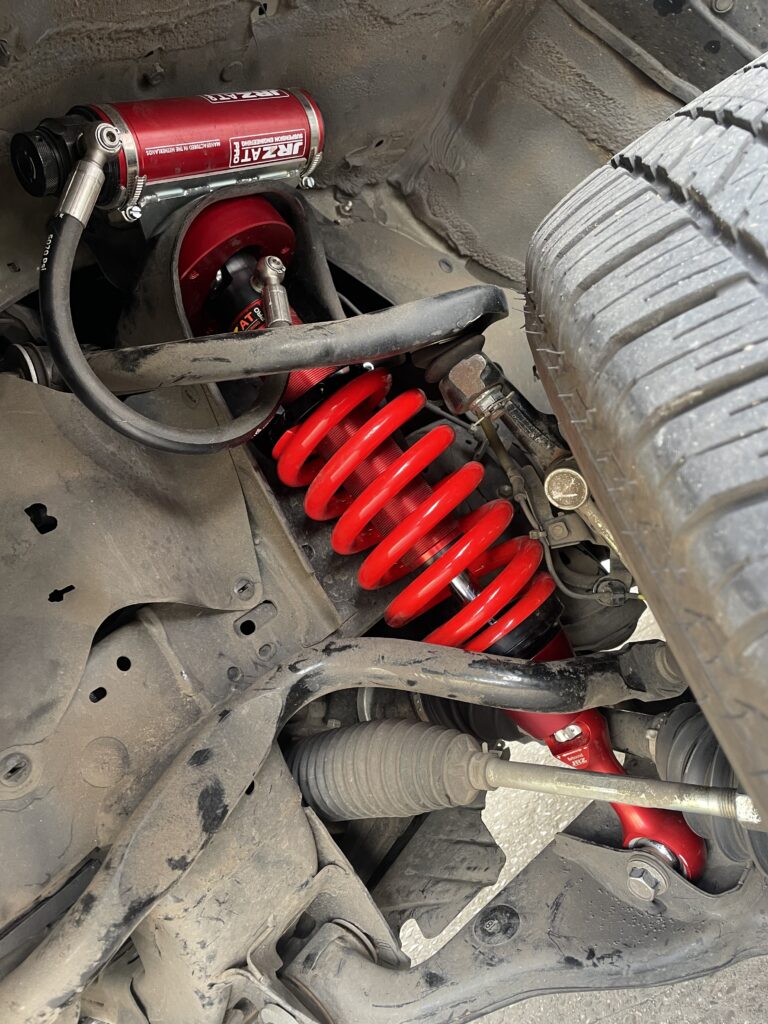 Veersysteem Toyota Hilux verzwaard en verhoogd